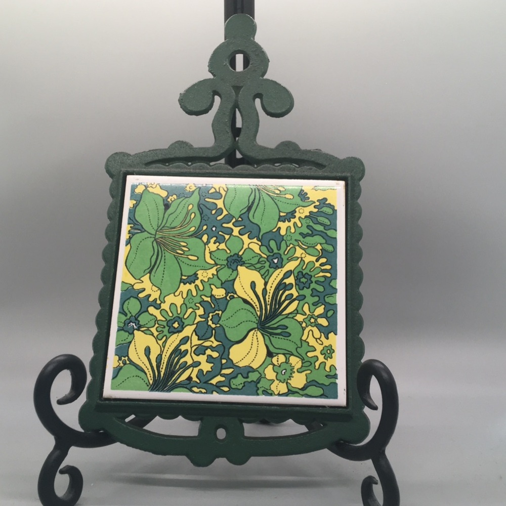 70’s Cast Iron and Tile Trivet. Retro green and yellow floral design